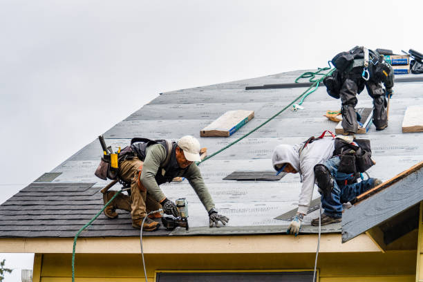 Professional Roofing technician working in Ledyard, CT